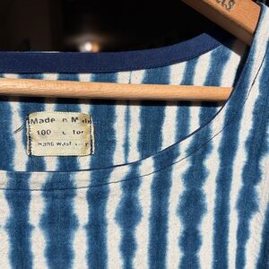 Hand-dyed batik style dress from Mali. One of a kind piece. Very cute w/ belt.